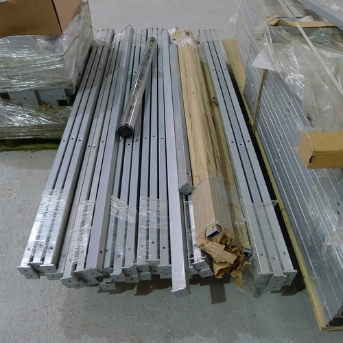 140 - 5 pallets containing a quantity of various grey metal table frame parts