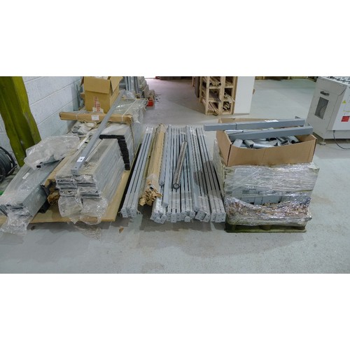 140 - 5 pallets containing a quantity of various grey metal table frame parts