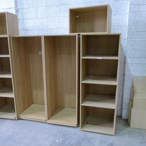 146 - A quantity of wood effect open front shelf units