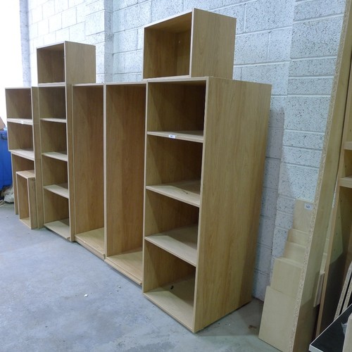 146 - A quantity of wood effect open front shelf units