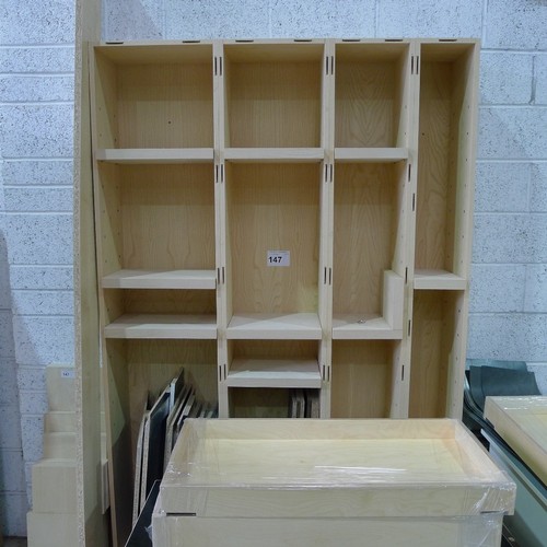 147 - A quantity of various items including a tall light wood effect shelf unit (will require carefully un... 