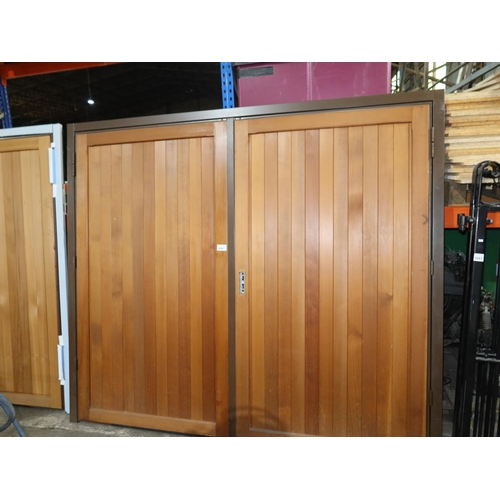 1086 - A Kingsbury timber & metal side hinged centre opening double garage door with frame approx 2520 x 21... 