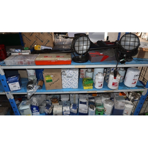 1200 - A quantity of various items including a 36 inch adjustable wrench, auto bulbs, oil filters, fuel fil... 