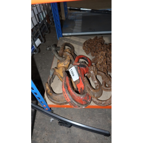 1209 - 2 swivelling metal lifting hooks and 1 length of chain with a ring on one end and a hook on the othe... 