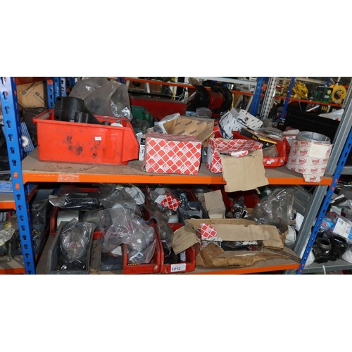 1212 - A quantity of plastic Lin type storage bins containing various auto related items including brake pa... 