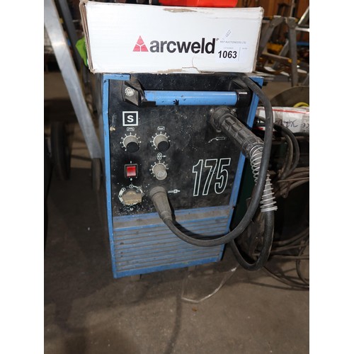 1063 - 1 welder by Eland Mig type 175, 240v, with leads, gas gauge, a welding mask etc