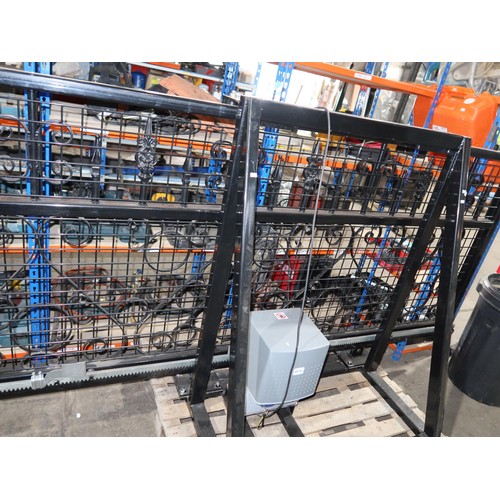 1081 - An ex-demo slide automated metal gate in a black metal frame, 240v, overall approx 300cm wide. This ... 