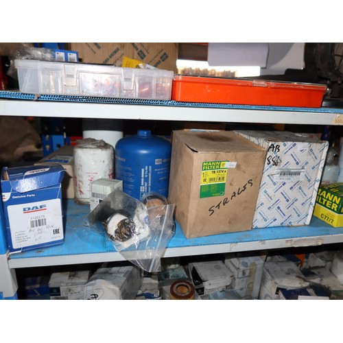 1200 - A quantity of various items including a 36 inch adjustable wrench, auto bulbs, oil filters, fuel fil... 