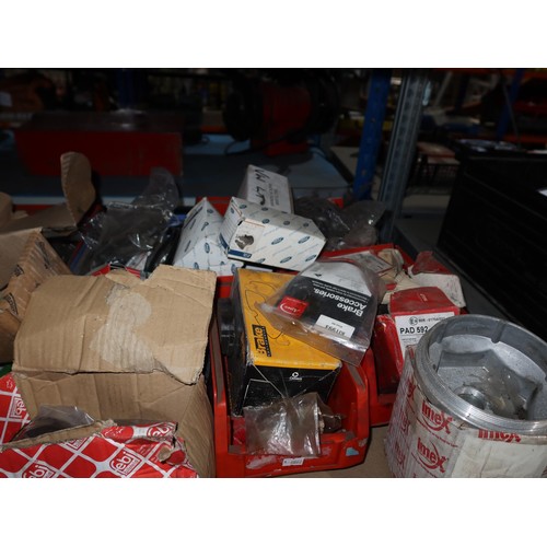 1212 - A quantity of plastic Lin type storage bins containing various auto related items including brake pa... 