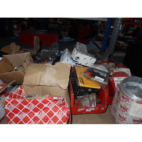 1212 - A quantity of plastic Lin type storage bins containing various auto related items including brake pa... 