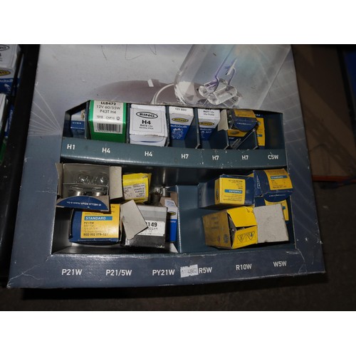 1213 - 2 display racks and 2 display boxes containing a quantity of various auto bulbs. Contents of 2 shelv... 