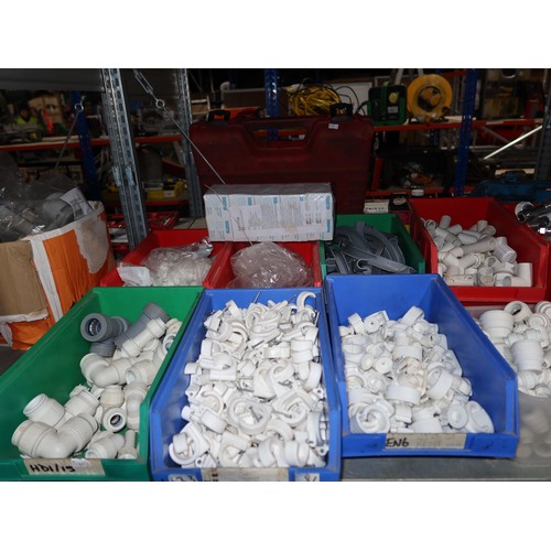 1217 - A quantity of Lin type plastic storage bins containing a quantity of various plumbing related items ... 