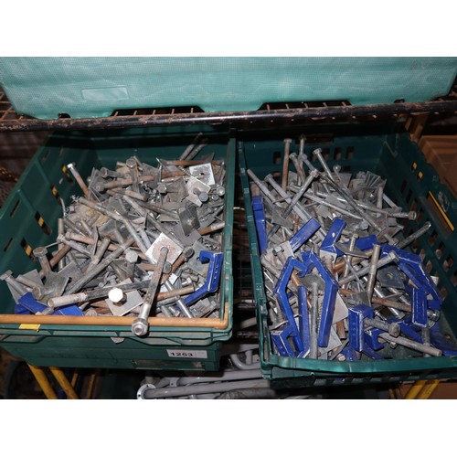 1253 - A quantity of various long bolts, nuts, washers, coach bolts etc. Contents of 2 shelves and the plas... 