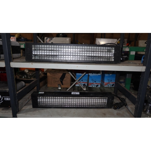 372 - 2 lights type (H) G007/UA (SRL-579A) 240v, each approx 65cm wide. Contents of 2 shelves