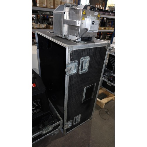 317 - A Barco BME FLM HD18 projector 240v supplied in a wheeled flight case together with a remote control... 