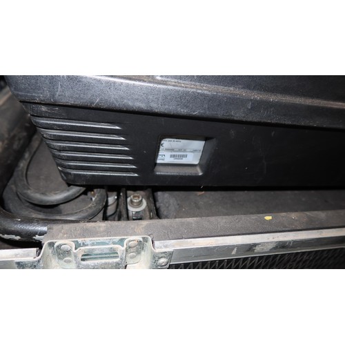 317 - A Barco BME FLM HD18 projector 240v supplied in a wheeled flight case together with a remote control... 