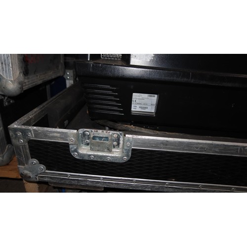 318 - A Barco BME FLM HD18 projector 240v supplied in a wheeled flight case together with a remote control... 