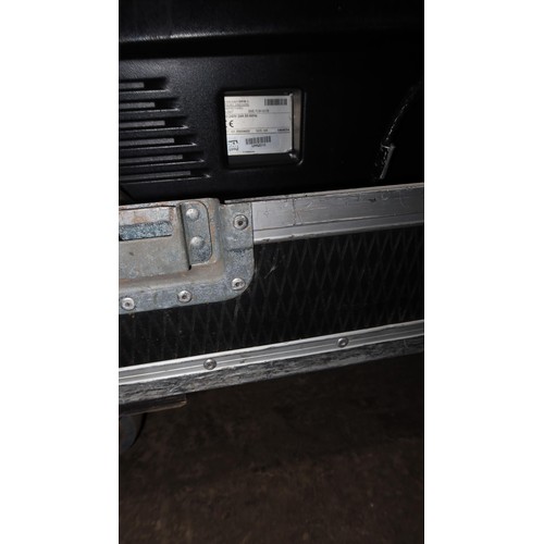 319 - A Barco BME FLM HD18 projector 240v supplied in a wheeled flight case together with 1 x TLD Zoom (2.... 