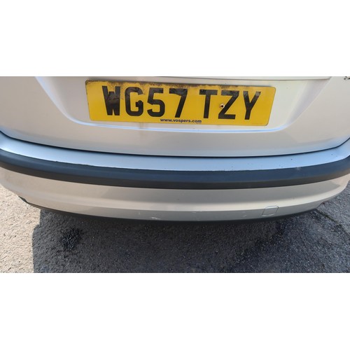 1718 - Ford Focus Style 5 dr Hatchback, silver, Reg WG57 TZY , 1st reg 31/12/2007, 5 spd manual petrol 1596... 