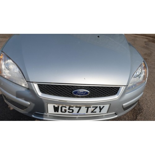 1718 - Ford Focus Style 5 dr Hatchback, silver, Reg WG57 TZY , 1st reg 31/12/2007, 5 spd manual petrol 1596... 