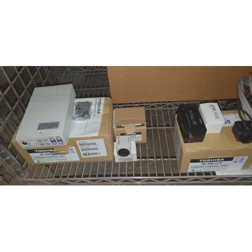 298 - 2 Toshiba compact cameras with various leads comprising of a Toshiba 3CCD 1080i camera head model IK... 