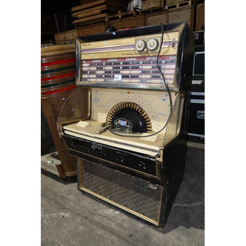 3057 - A United Music Corp Juke box model UPA 100. This is a vintage Jukebox suitable for restoration / spa... 