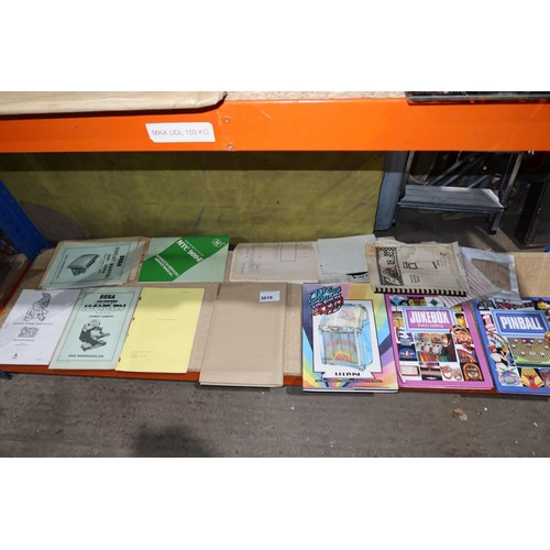 3019 - A quantity of various items including vintage operators manuals for Sega Super Hang on, Atari Crysta... 