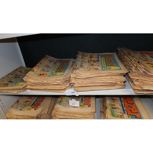 3097 - A large quantity of vintage Beezer comic books from 1968 to 1974, contents of 2 shelves