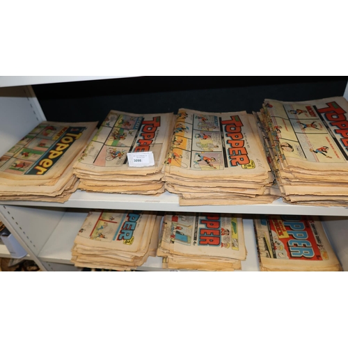 3098 - A large quantity of vintage Topper comic books from 1968 to 1975, contents of 2 shelves