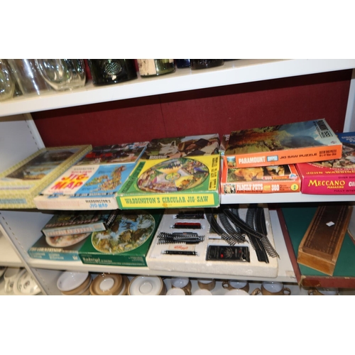 3165 - Vintage Hornby battery operated train set and a quantity of miscellaneous other games and jigsaws et... 