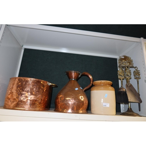 3183 - A copper cauldron, a conical copper measure, a stoneware jar and a brass companion set (one shelf)