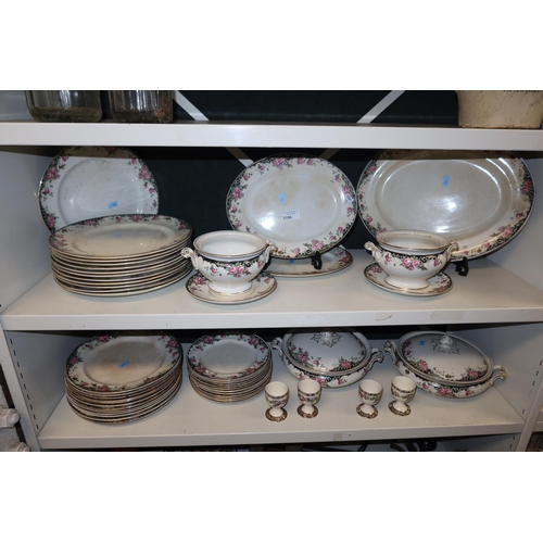 3186 - A quantity of rose patterned dinnerware (2 shelves)