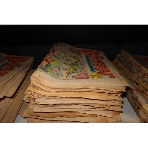 3097 - A large quantity of vintage Beezer comic books from 1968 to 1974, contents of 2 shelves