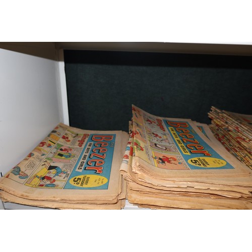 3097 - A large quantity of vintage Beezer comic books from 1968 to 1974, contents of 2 shelves