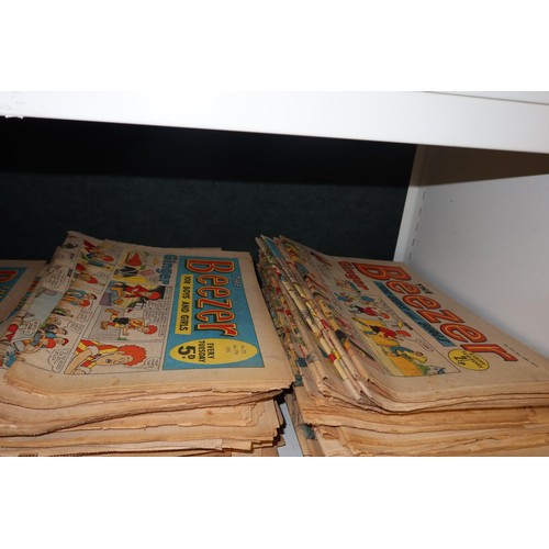 3097 - A large quantity of vintage Beezer comic books from 1968 to 1974, contents of 2 shelves