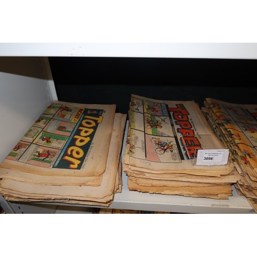 3098 - A large quantity of vintage Topper comic books from 1968 to 1975, contents of 2 shelves