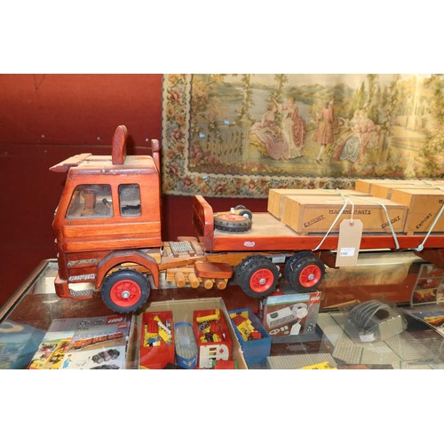 3100 - A large working wooden model of a Scania 142e articulated lorry approx 1.4m in length with flatbed t... 
