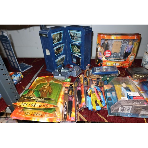 3111 - A quantity of various Doctor Who collectibles including sealed character option figures, a trading c... 