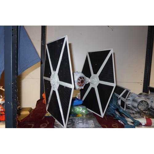 3122 - A quantity of various Star Wars items including a 15 inch tie fighter, a tie bomber, a General Veers... 