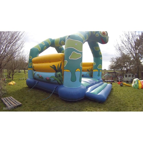 2092 - A 20 x 23ft inflatable bouncy castle (frog) supplied with an inflating blower 240v, a rain cover and... 