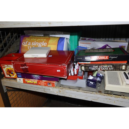 2119 - A quantity of various items including games, a vintage white Yamaha keyboard, a Fiskars rotary fabri... 