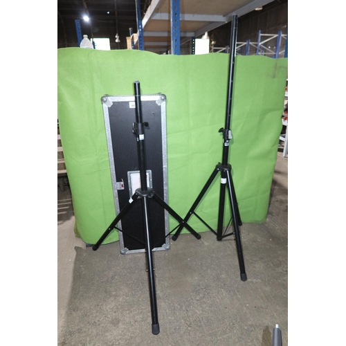 64 - 2 x K & M heavy duty folding tripod speaker stands supplied in a flight case with hinged top approx ... 