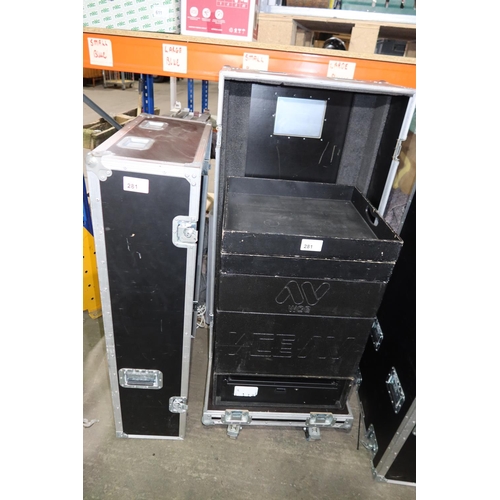 281 - 1 wheeled storage flight case with two part lift off top containing a various black stacking storage... 