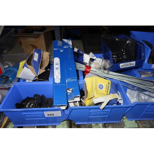 265 - A quantity of blue plastic stores bins containing a quantity of various items including electrical a... 