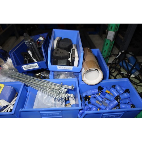 265 - A quantity of blue plastic stores bins containing a quantity of various items including electrical a... 