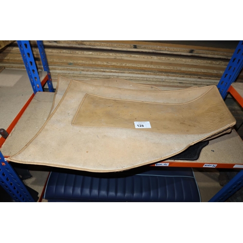 128 - 4 various vintage floor mats. Contents of 1 shelf