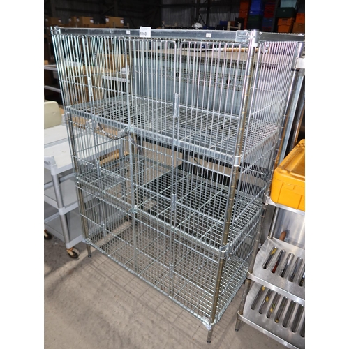 1160 - A large bay of catering type racking enclosed in a lockable cage with 3 shelves approx 123x163x 172c... 