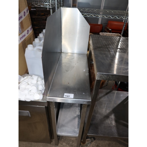 1187 - A commercial stainless steel catering type insert table with shelf beneath and tall splash back appr... 