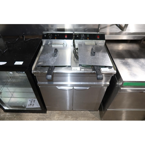 1218 - A commercial stainless steel twin basket deep fryer by Combi steel 2 door cupboard beneath, requires... 