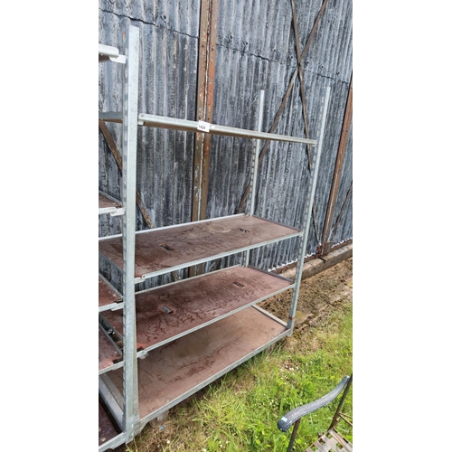 1424 - A mobile adjustable shelving rack with 4 shelves